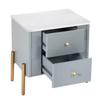 Table de chevet minimaliste moderne avec 2 tiroirs, poignées dorées et design texturé