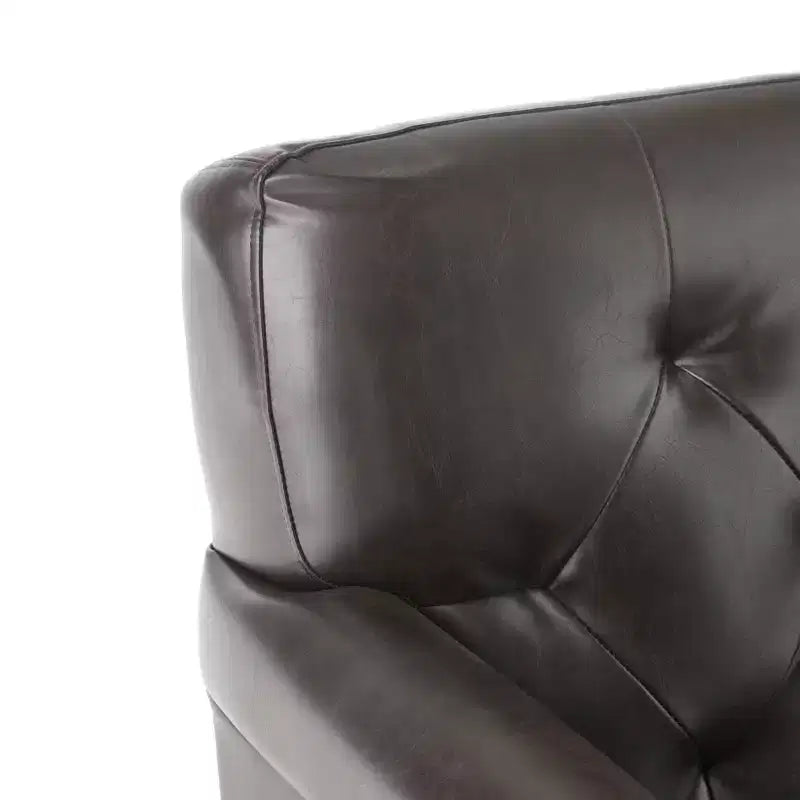 Fauteuil club contemporain capitonné en cuir reconstitué avec accoudoirs arrondis